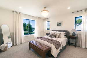 Bedroom with recessed lighting and carpet flooring