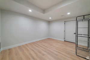 Spare room featuring recessed lighting and light wood-style flooring