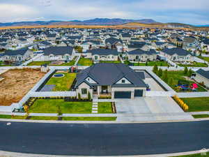 Aerial view of residential area with a mountain backdrop