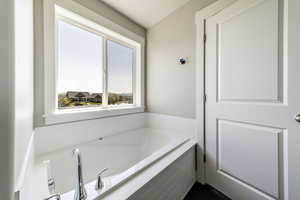 Bathroom featuring a garden tub