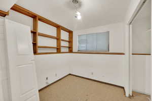 Spare room with baseboards