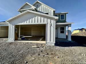 View of front of house featuring board and batten siding
