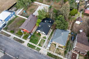 Aerial view of property's location with nearby suburban area