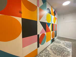 Corridor featuring baseboards