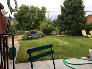 View of yard with a patio