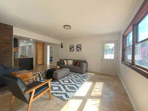 Living room featuring light tile patterned flooring