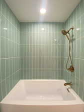 Bathroom featuring bathing tub / shower combination