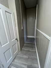 Hallway featuring wood finished floors