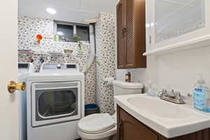 Bathroom with toilet and vanity