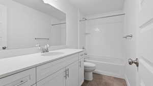Bathroom with washtub / shower combination and vanity