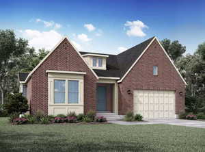 View of front of property featuring a front lawn, driveway, brick siding, and a garage