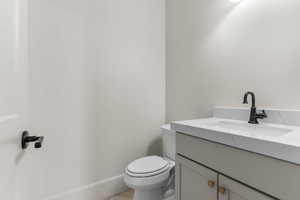 Bathroom with vanity and toilet