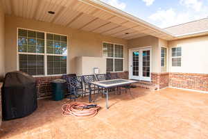 View of patio / terrace featuring outdoor dining area and area for grilling