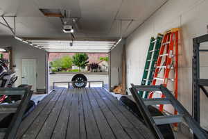 Garage featuring a garage door opener