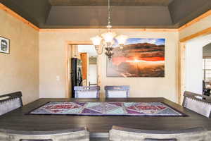 Dining space featuring a chandelier