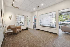 Common area with a paneled ceiling and recessed lighting