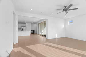 Unfurnished living room featuring recessed lighting, light wood-style floors, and ceiling fan