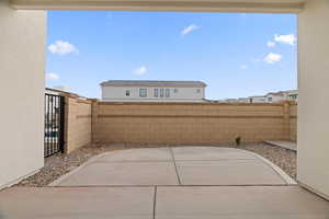 Fenced backyard featuring a patio
