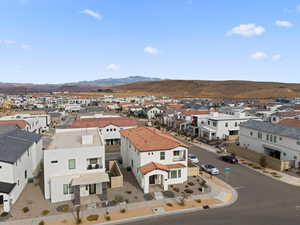 Aerial view of residential area with mountains