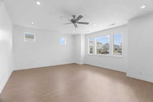 Empty room featuring recessed lighting, light wood-style floors, and ceiling fan