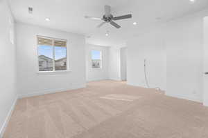 Unfurnished room with light carpet, recessed lighting, and ceiling fan