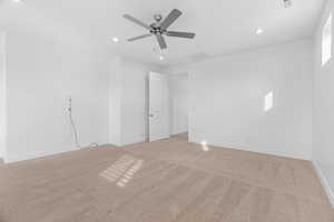 Spare room with light colored carpet, recessed lighting, and ceiling fan