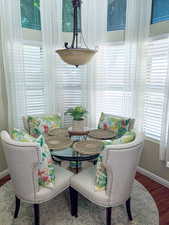 Dining room with wood finished floors and baseboards