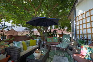 View of patio / terrace featuring outdoor lounge area and a deck
