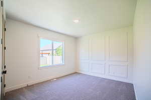 Unfurnished bedroom featuring carpet floors and recessed lighting