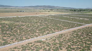 View of rural area with a mountainous background