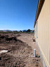 View of yard with a mountain view