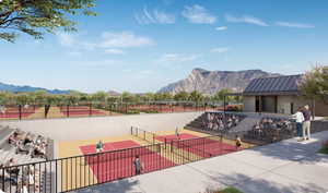 View of property's community featuring a mountain view and a tennis court