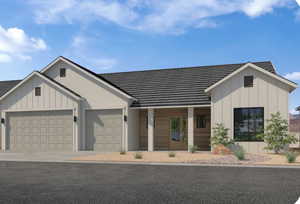 Modern inspired farmhouse with board and batten siding, covered porch, an attached garage, and driveway