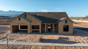 Property in mid-construction featuring a mountain view