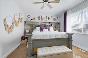 Bedroom with carpet floors and ceiling fan