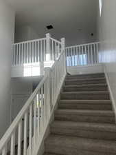 Stairs featuring baseboards