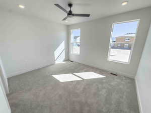 Spare room featuring carpet floors, recessed lighting, and ceiling fan