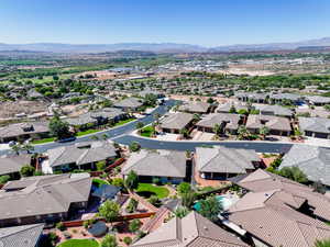 Aerial view of residential area with a mountainous background