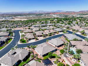 Aerial view of residential area with a mountainous background