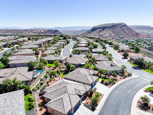 Aerial view of residential area with a mountainous background