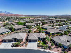 Aerial view of residential area with a mountainous background
