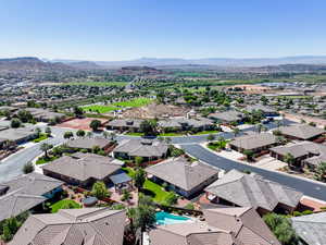 Aerial view of residential area with a mountainous background