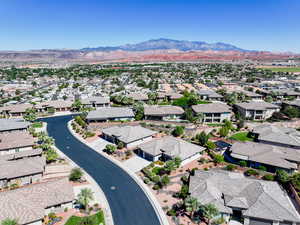 Aerial view of residential area with a mountainous background