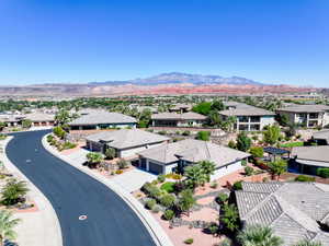 Aerial view of residential area with a mountainous background