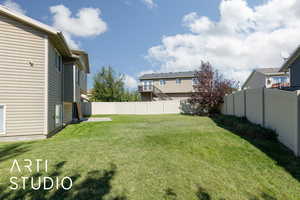View of fenced backyard