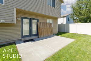 Property entrance featuring a patio
