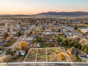 View of property location featuring property boundaries highlighted and nearby suburban area