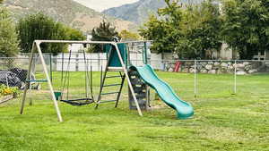View of play area with a mountain view