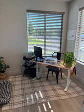 Office space featuring light wood-style floors