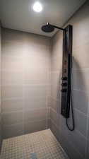 Bathroom with tiled shower